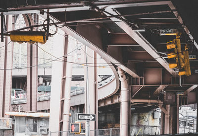 Low angle view of railroad tracks in city