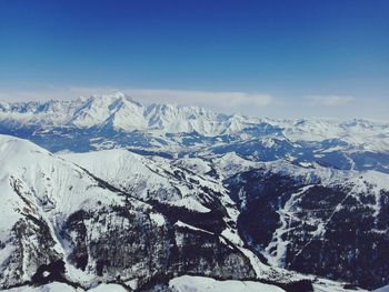 Idyllic shot of snowcapped mountains against sky