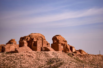 Sunset over the ruins of an ancient building