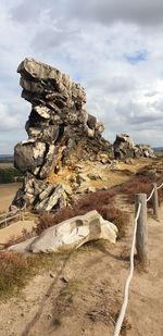 View of rock formations at desert against sky