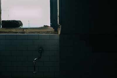 Sky seen from abandoned bathroom window