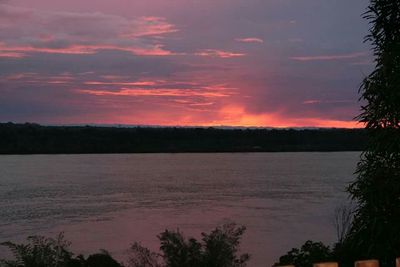 Scenic view of lake at sunset