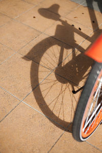 Close-up of shadow on bicycle