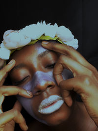 Close-up of woman with face paint