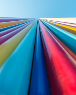 Low angle view of multi colored built structure against clear sky