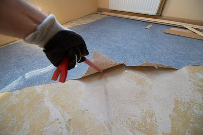 Close-up of hands working at home