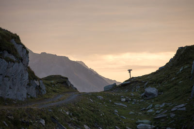 Scenic view of mountains against sky during sunset