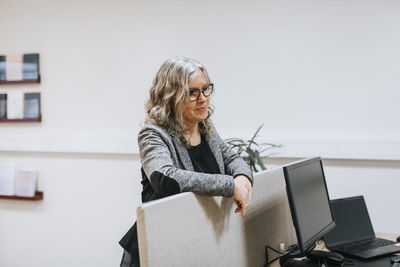 Woman standing in office