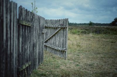 Built structure on field against sky