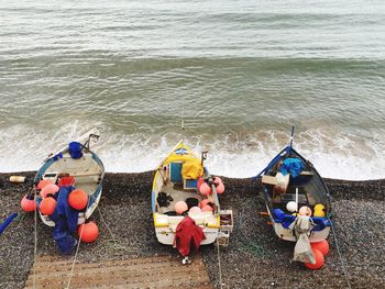 High angle view of boats moored at beach