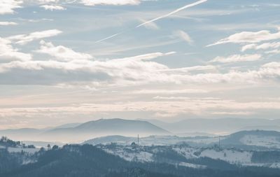 Scenic view of mountains against sky during sunset