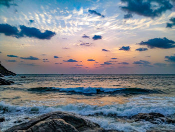 Scenic view of sea against sky during sunset