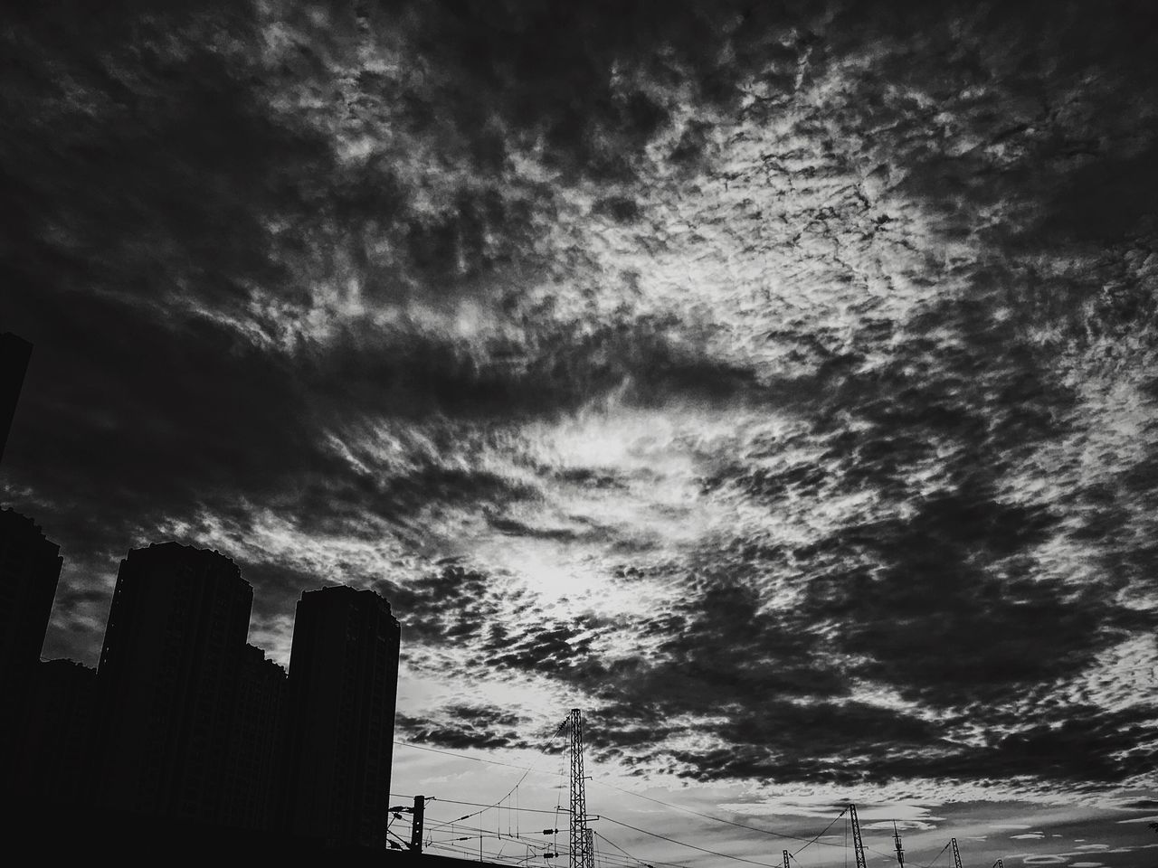 sky, weather, silhouette, cloud - sky, low angle view, no people, nature, beauty in nature, sunset, outdoors, built structure, architecture, building exterior, storm cloud, tree, day