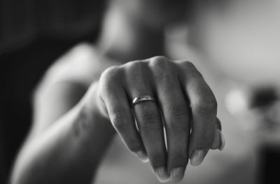 Close-up of woman wearing ring