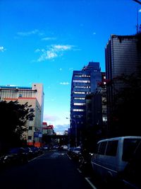 Road along buildings in city