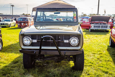 Vintage car parked on field