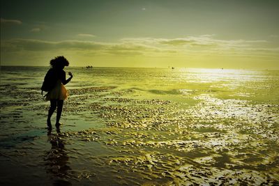 Scenic view of sea at sunset