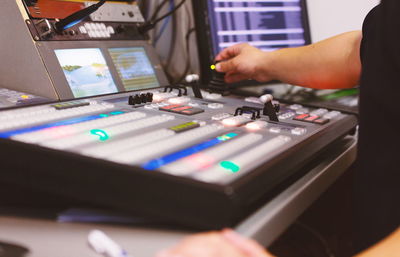 Cropped image of man using sound mixer 