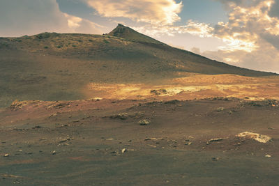 Scenic view of mountains against sky during sunset