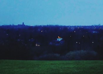 Scenic view of landscape against sky at night