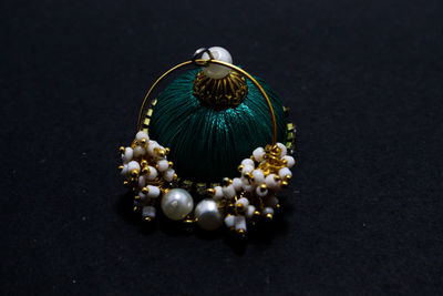 High angle view of butterfly over black background