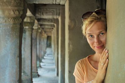 Portrait of smiling woman at temple