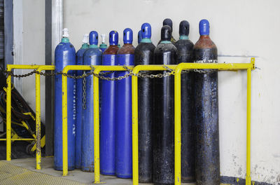 Close-up of multi colored bottles on table