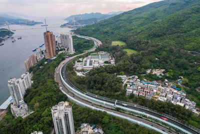 Aerial view of s shape highway across the mountain