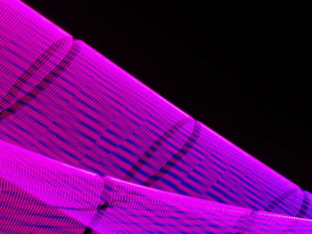 Close-up of multi colored lights against black background