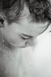 Close-up of young woman in water