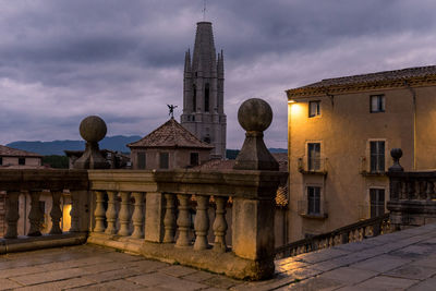 Exterior of old building against sky at dusk