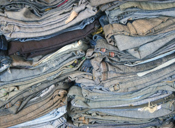 A stack of old blue jeans