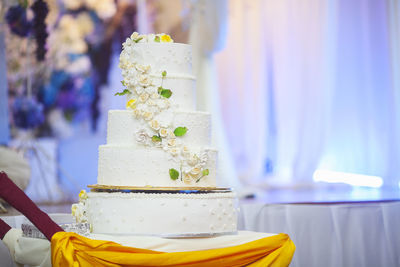 Close-up of wedding cake on table