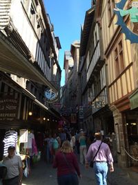 People walking on street in city