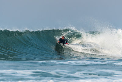 Man surfing in sea