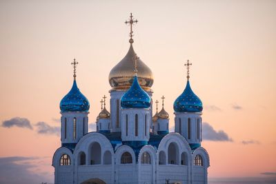 Cathedral of building against sky during sunset