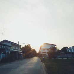 View of road along buildings