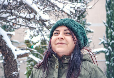 Portrait of young woman in winter