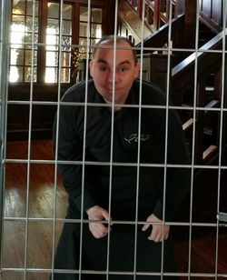 View of a boy in cage