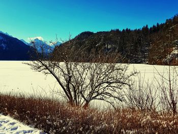 Scenic view of snowcapped mountains against sky