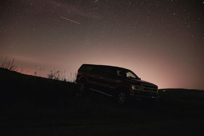 Car against sky at night