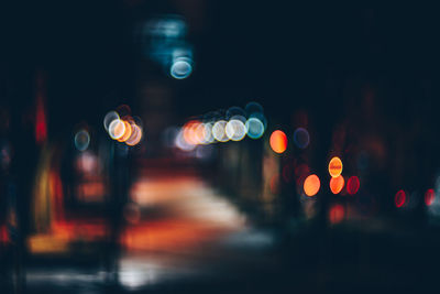 Defocused image of illuminated lights at night