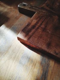 High angle view of piano on wooden table