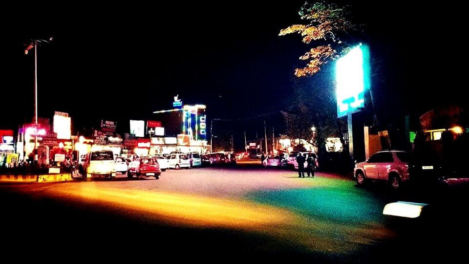STREET LIGHTS IN CITY AT NIGHT