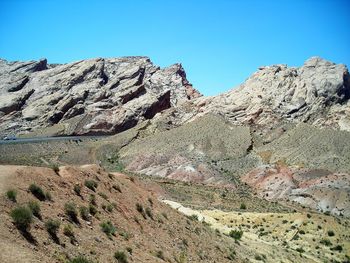 Scenic view of rocky mountains against clear sky