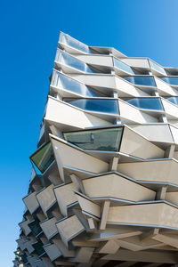 Low angle view of building against clear blue sky