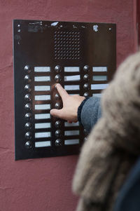 Close-up of hand pressing button