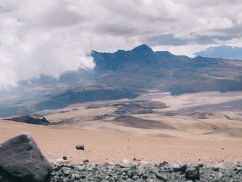 Scenic view of clouds covering mountains