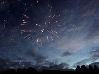 Firework display at night