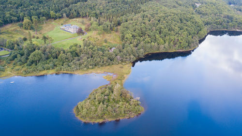 High angle view of trees by lake